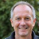 Client testimonial photo of a smiling man